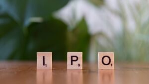 Wooden blocks spelling IPO, symbolizing investment in pre-IPO deals